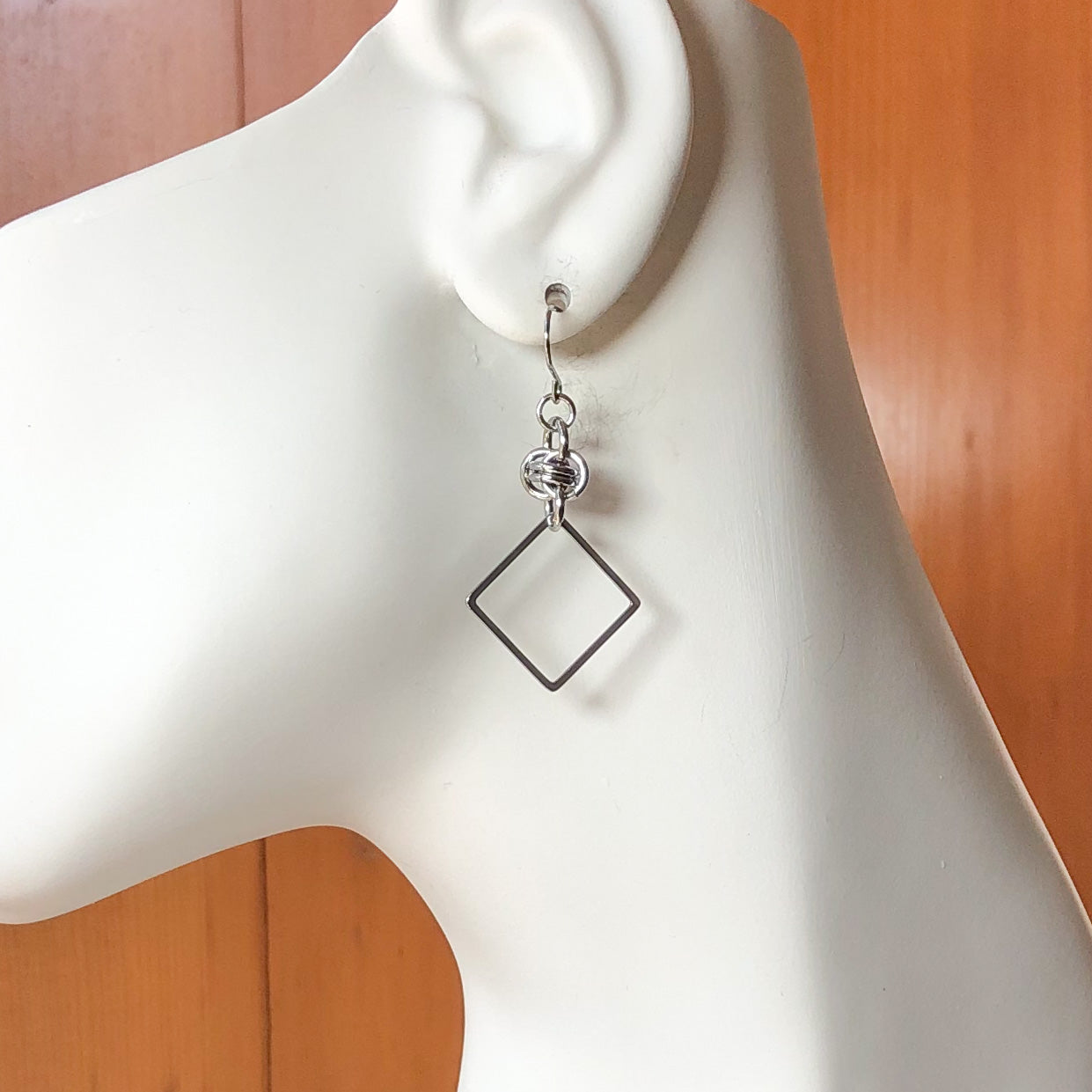 Stainless Steel Square Earrings - Flower Knot